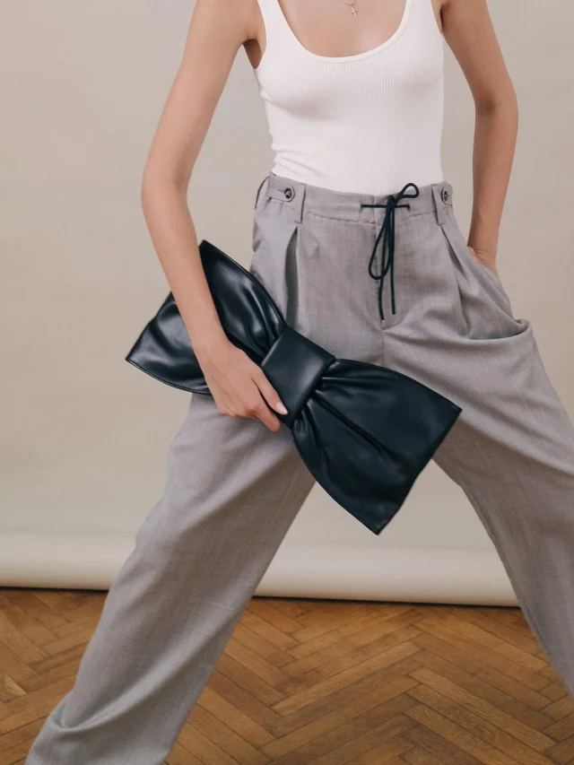 Take a bow • Optimef Knot Clutch is available on optimef.com • Soft Italian leather, handcrafted in Romania