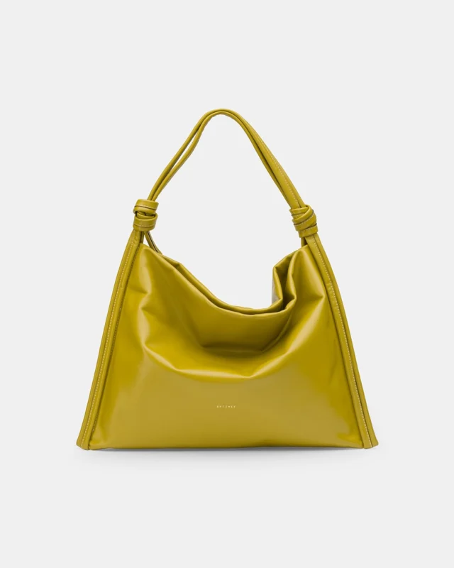 Knot Bag / Citrine: a simple construction that highlights the suppleness of the finest Italian leather • Made in Ro • Styled by @anamaria_bucura